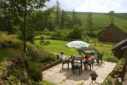 Patio of Mill Pond Cottage with spectacular view of the hills